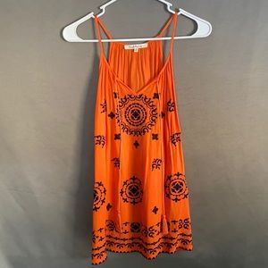Medium orange tank top. Never worn.